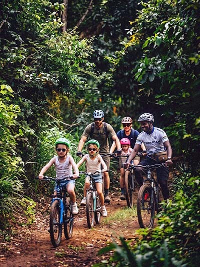 Group cycling through the landscape between Kilimanjaro and Mount Meru